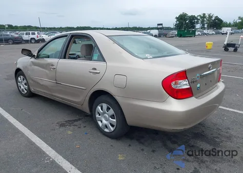 2002 Toyota Camry Le from USA, damaged, VIN 4T1BE30K42U106391